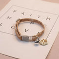 Halsband mit Glöckchen – Pfotenmuster